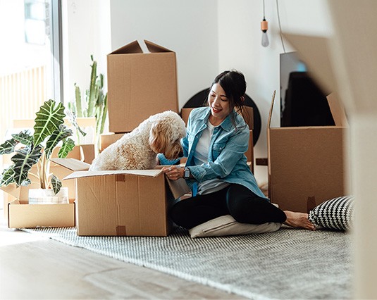 Woman packing with dog