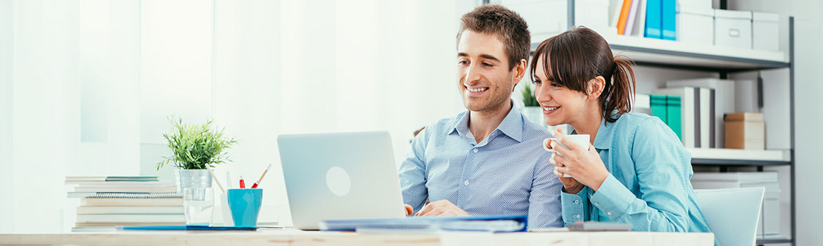 Couple looking at a computer 