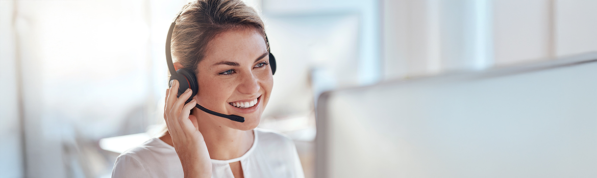 woman with headset talking on the phone