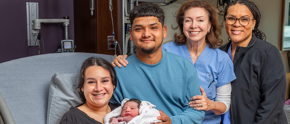 Parkland Health health care providers pose with new parents