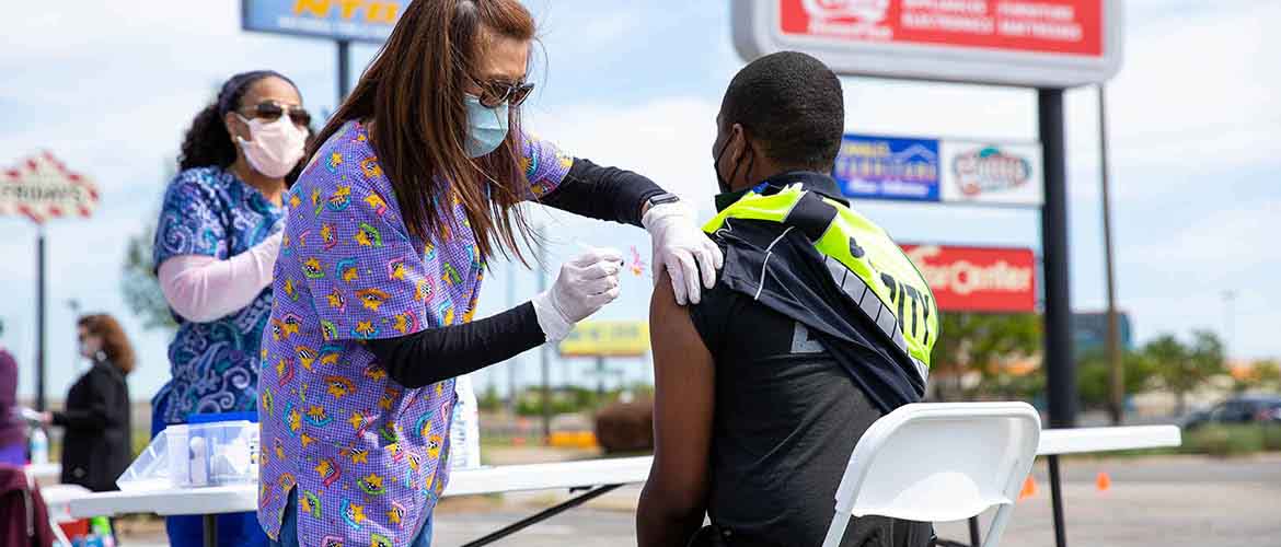 COVID-19 vaccines given at a clinic outside a Dallas-area Sanitas Medical Center