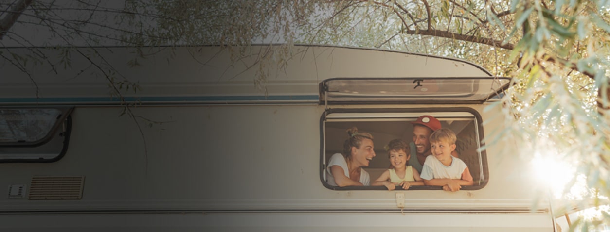 Family looking out of camper