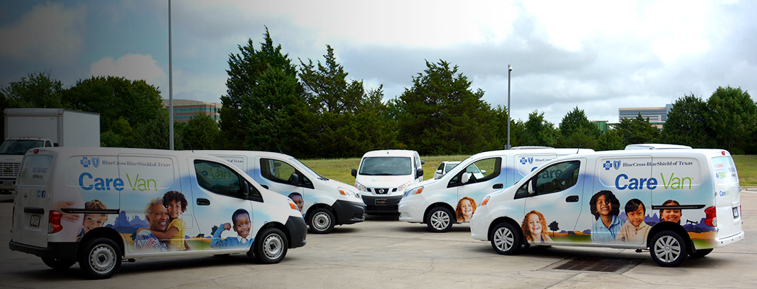 Fleet of Care Vans parked together.