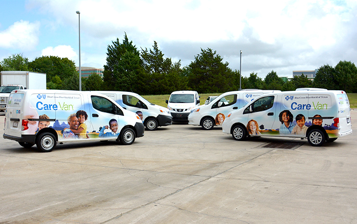 Fleet of Care Vans parked together. 