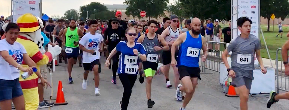 Runners take-off at starting line of race