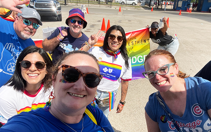 Employees at pride parade celebration